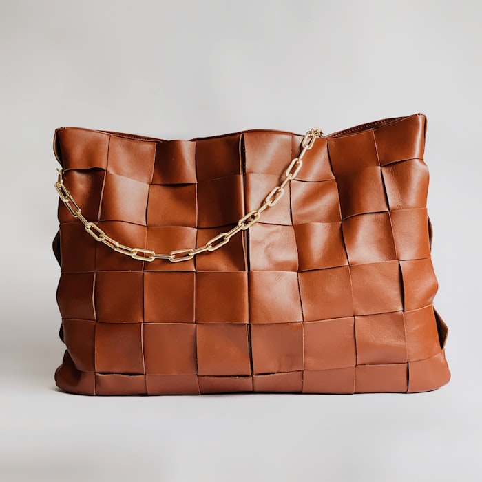 Woven leather tote with chain handle
